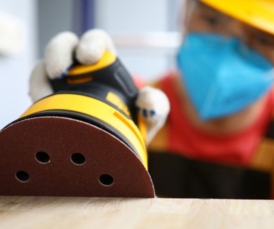 Image of Orbital Sander Sanding Wood