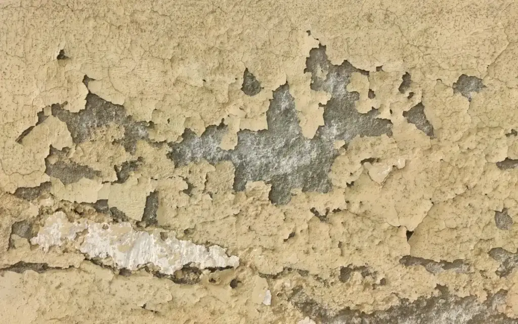 how to fix cracked paint on walls