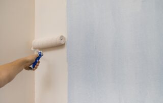 how to fix cracked paint on walls