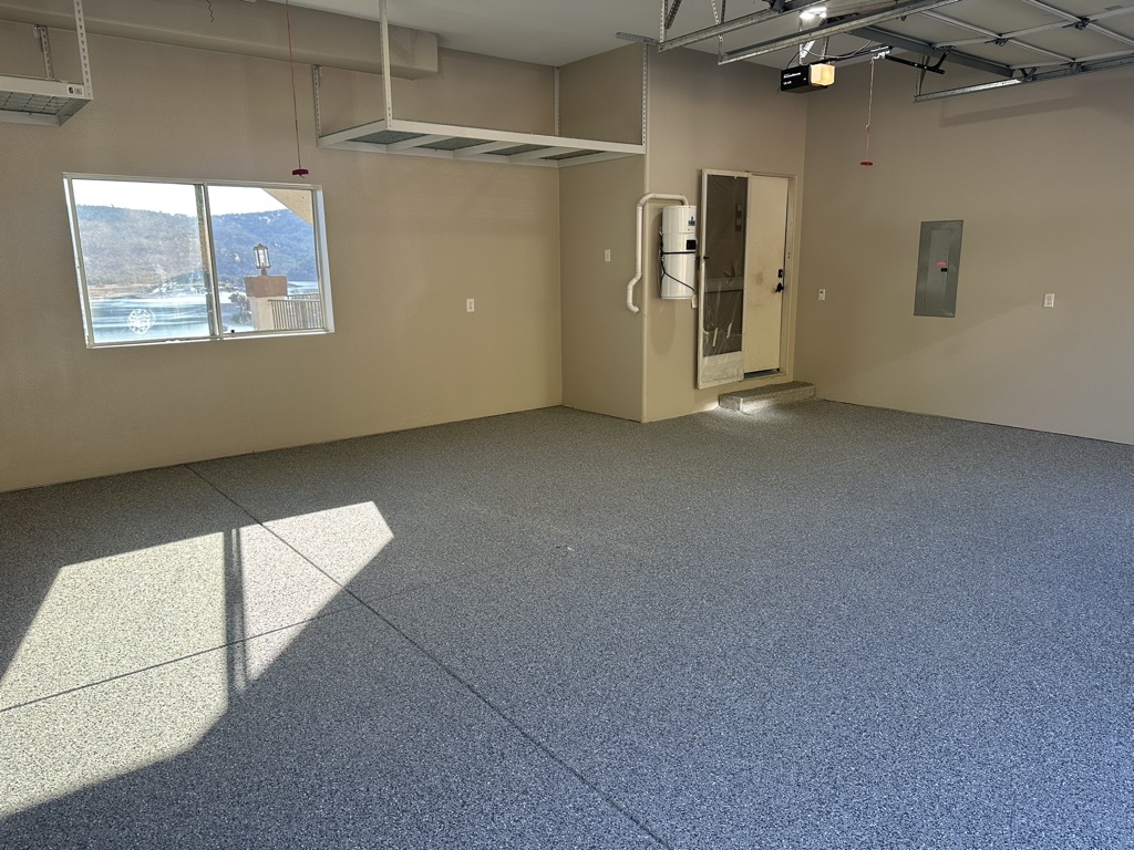 Loomis Epoxy Garage Floor – Trico Painting | Decorative Flake System & High-Gloss Finish Epoxy garage floor in Loomis, CA installed by Trico Painting — featuring a decorative flake system and high-gloss finish that transformed this space into a clean, showroom-quality garage.