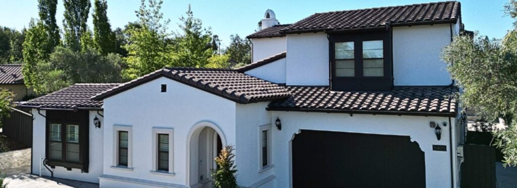 Best Stucco House Colors For 2026 | Trico Painting 1 Best stucco house colors for 2026 featuring a modern white stucco home with dark trim, painted by Trico Painting in Granite Bay, CA.