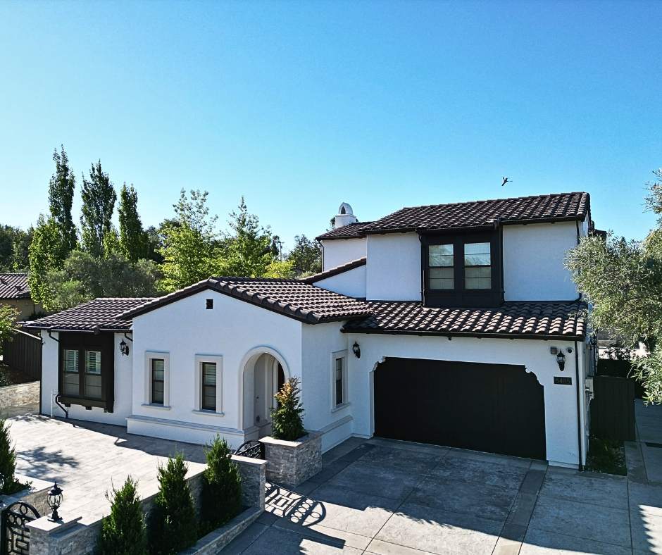 Modern white stucco house with dark trim painted by Trico Painting in Granite Bay near Roseville, California.