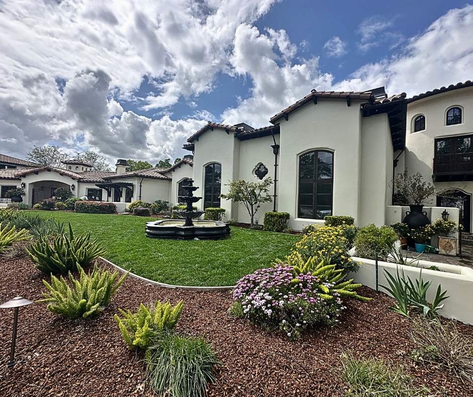 Mediterranean stucco exterior painted by Trico Painting with warm neutral tones (2026 exterior color trend)